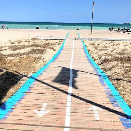 Feriehus Global Properties, Bonito Adosado Con Jardin En La Playa De Almarda *