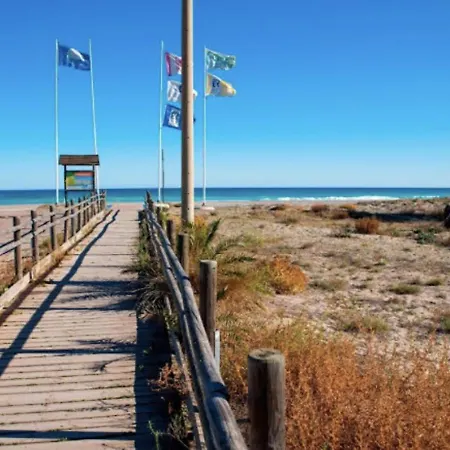 Global Properties, Bonito Adosado Con Jardin En La Playa De Almarda Sagunto